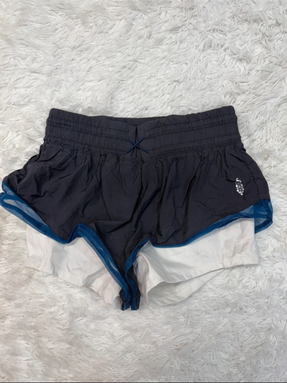 Free people movement Women’s Black Layered Athletic Shorts with Blue Trim
